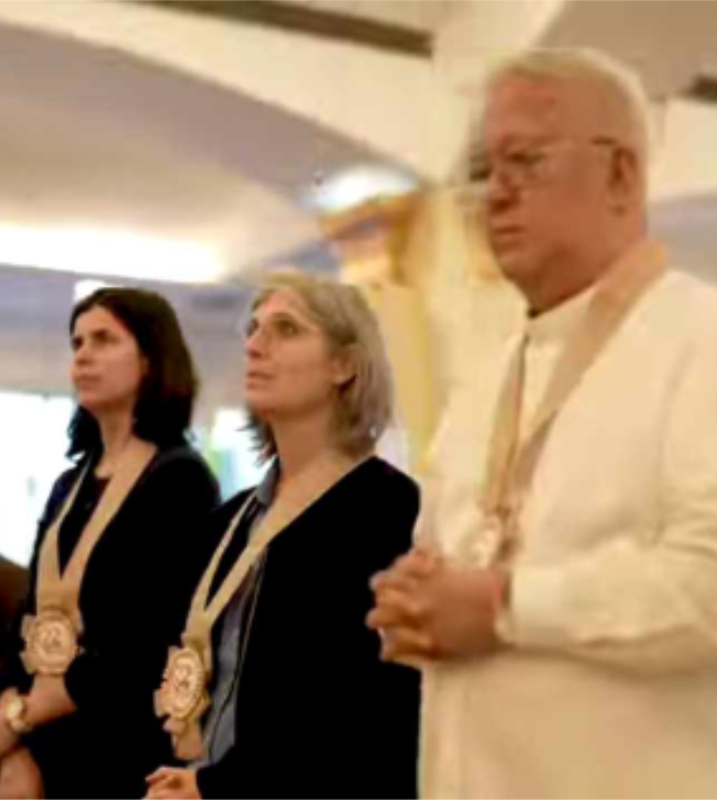 4 Gift giving of booklet for the Cause of Sr. Lucia\'s Great Vision of the Holy Trinity Booklet